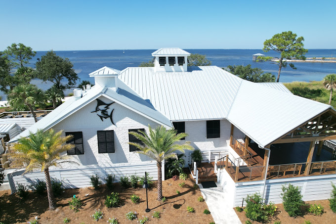 Custom-fitted standing-seam metal roofing system for a waterfront commercial property